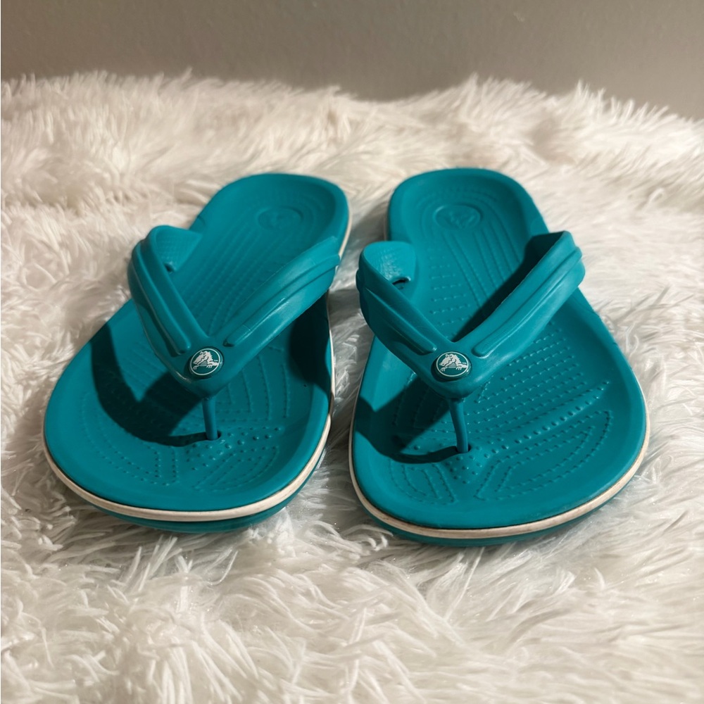 Crocs Women Teal Flip Flops size 8